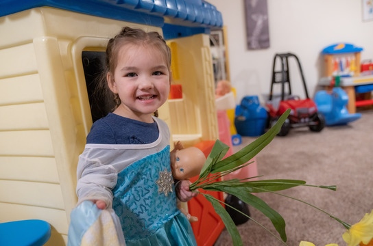 A girl playing at daycare