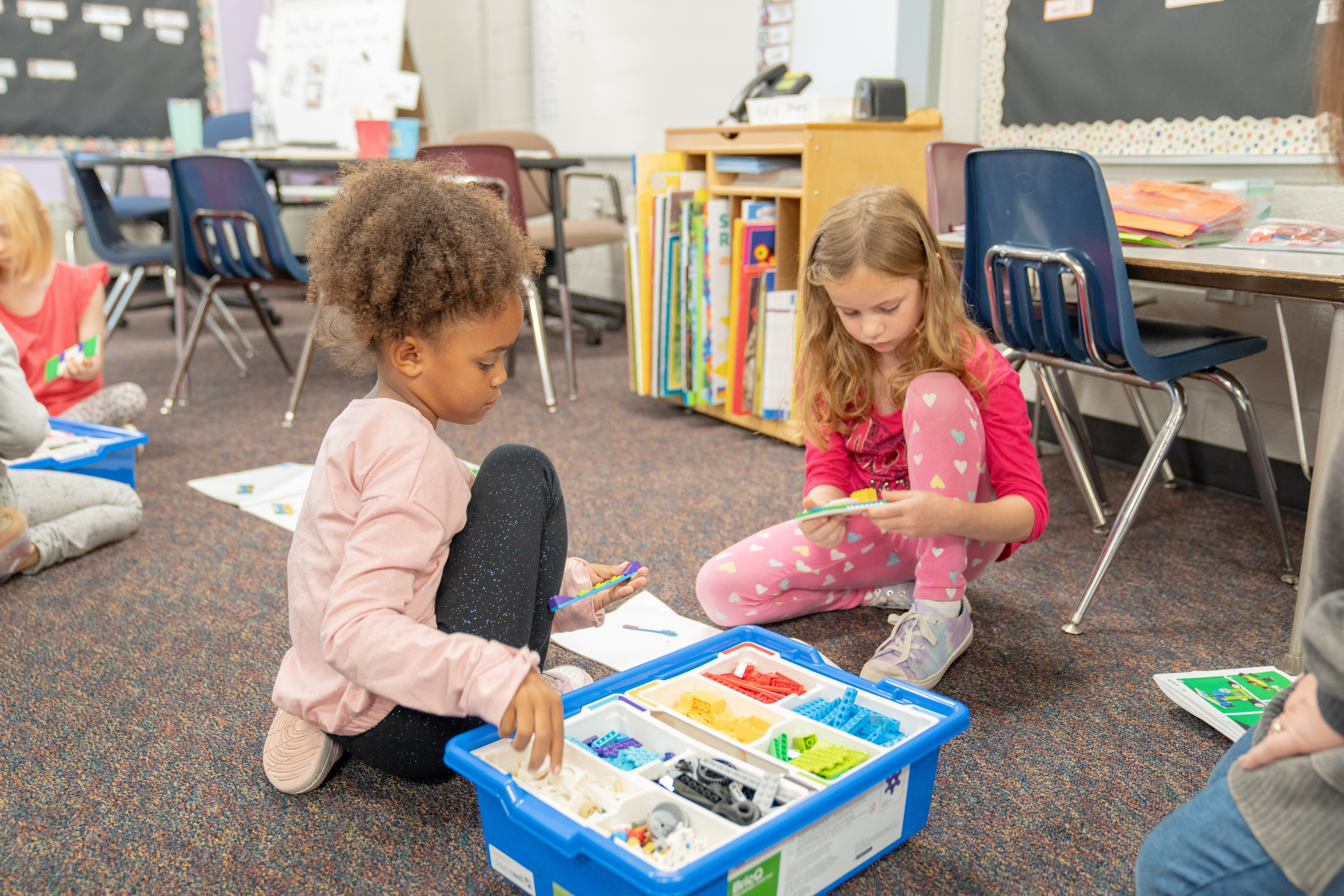 Two students working with STEMbound equipment